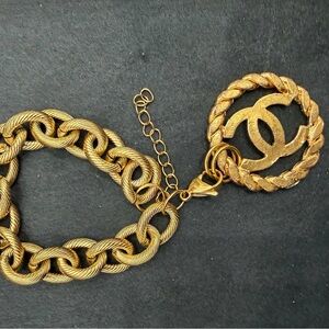 Chanel Gold toned Large CC Logo medallion with unbranded chain Bracelet